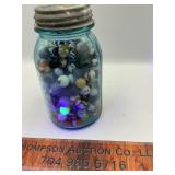 Vintage blue jar with marbles some uranium glass
