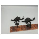 Cast iron dinosaur coat hooks