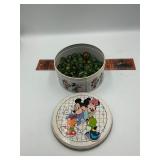 Disney tin with marbles