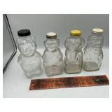 4 figural glass bottles