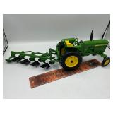 John Deere tractor and plow