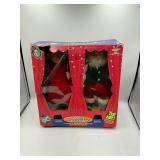 Dancing Claus couple
