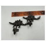 Cast iron dinosaur hooks