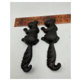 Cast iron squirrel hooks