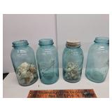 4 large blue jars
