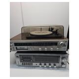 Vintage sound systems both power on