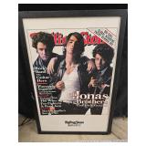 The Jonas Brothers Rolling Stone poster on board