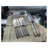 6 silver plated knives and 2 with sterling handles
