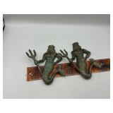Cast iron mermen hooks