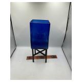 Blue glass vase with stand