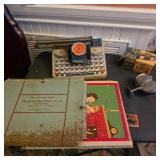 Puzzles, reel, viewfinder, toy typewriter