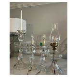 3 lamps and a candle holder
