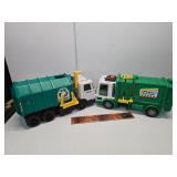 2 garbage trucks