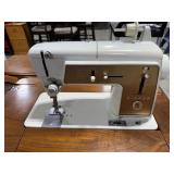 Singer Sewing Machine in Cabinet