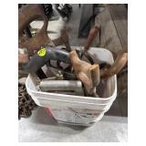 Bucket of Hand Saws