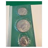 Three Uncirculated U.S. Coins in Clear Packaging