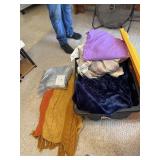 Tote of linens,  afghan, throws and more