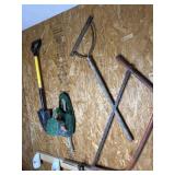 Shovel weed wacker saw and fertilizer spreader
