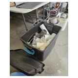 Tote of PVC pipe fittings