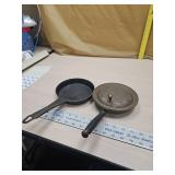 Copper crumb tray and cast skillet