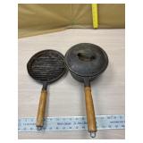 Wood handle cast iron pot and skillet