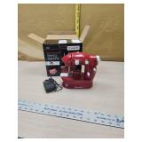 Mini sewing machine works
