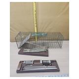 Live trap and gun cleaning kit