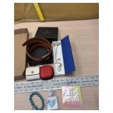 Chaoren Belt, Michel Korrs ear pod case, jewelry
