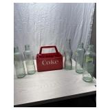 Plastic Coca Cola tray, 4 vintage coke bottles