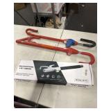 1 new steering wheel lock and 2 used