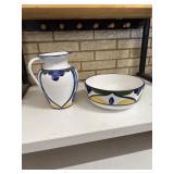 Matching bowl and pitcher