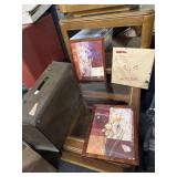 Brief case mirrors and art