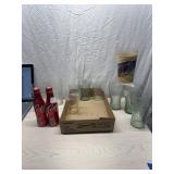 Coca Cola glasses and bottles