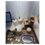 New scented candles and soap or lotion dispensers