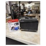 Cargo net and Esteban guitar Amp