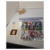 Baseball cards and collector stamp