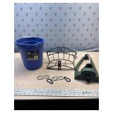 Oval bucket, hose hanger and sprinkler