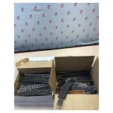 2 boxes of toy train track