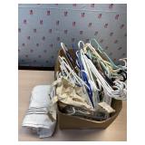 Large box of hagers and towel