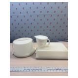 3 White Tupperware, cake Takers and 4 cup measure