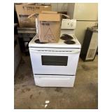 Frigidaire electric stove unknown and dishes