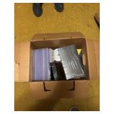 Large box of CD cases and CDs