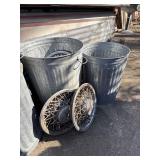2 galvanized trash cans with hub caps