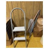 Step stool, broom handle and table top ironing
