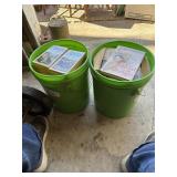 2 pickle buckets full of books