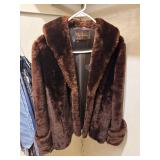 Womenï¿½s faux fur coat medium?