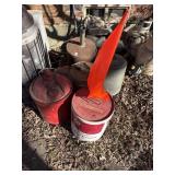 Lot of gas cans and old funnel