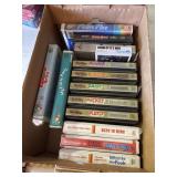 Box of Walt Disney and other VHS tapes