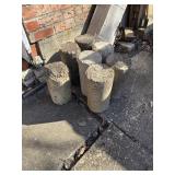 Cement pillars, wood, flower pots take what you