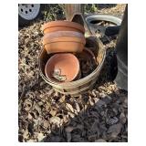 Basket and terracotta water bases